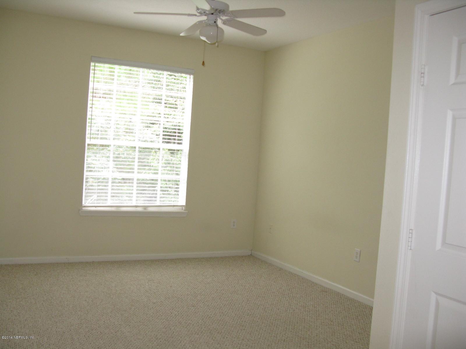 10550 Baymeadows Road, Unit 623 Jacksonville, FL 32256 - Photo 7 of 20 an empty room with a window