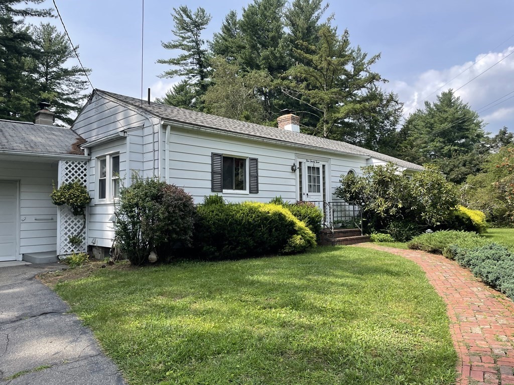 423 Florence Road Northampton, MA 01062 - Photo 1 of 32 a view of a house with backyard and garden