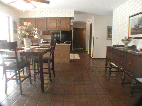 11624 Bend River Road Roscoe, IL 61073 - Photo 9 of 11 a view of a dining room with furniture
