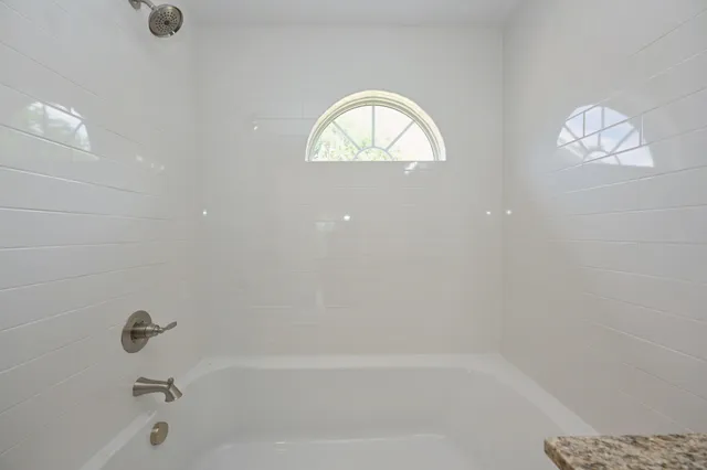 a bathroom with a tub
