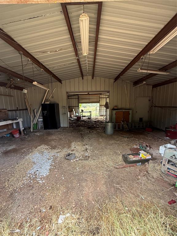 319 County Road 4868 Azle, TX 76020 - Photo 16 of 22 a view of parking garage with car parked