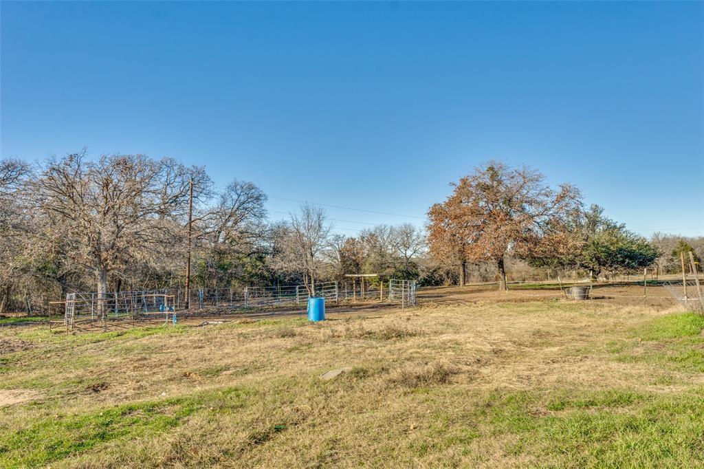 319 County Road 4868 Azle, TX 76020 - Photo 9 of 22 a view of a yard with a house