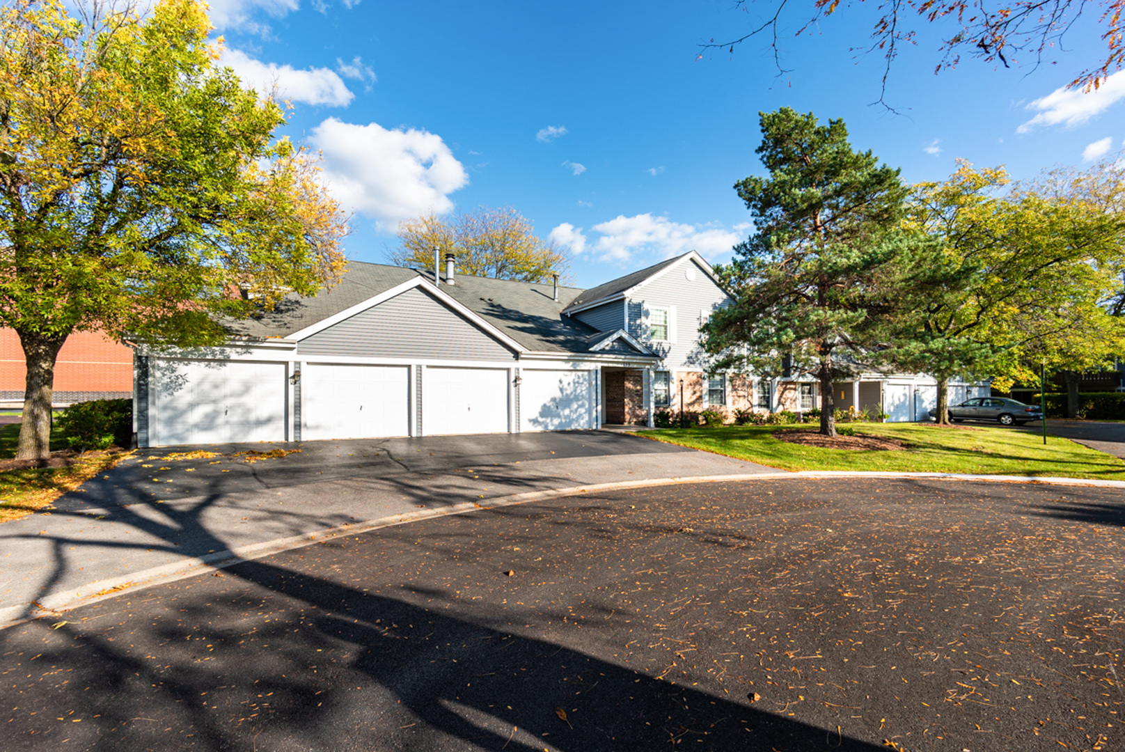 a view of a house with swimming pool and sitting area