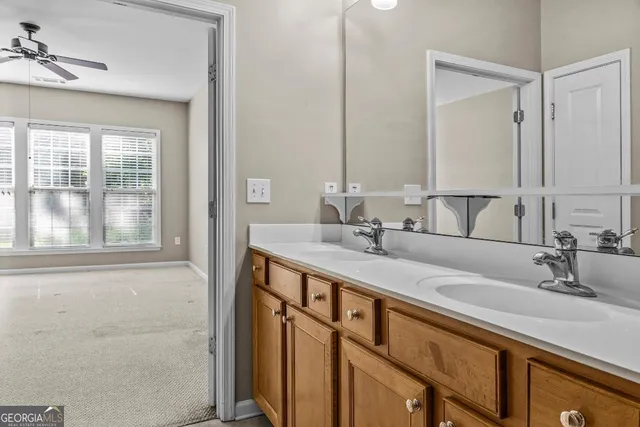 a bathroom with a toilet and a sink