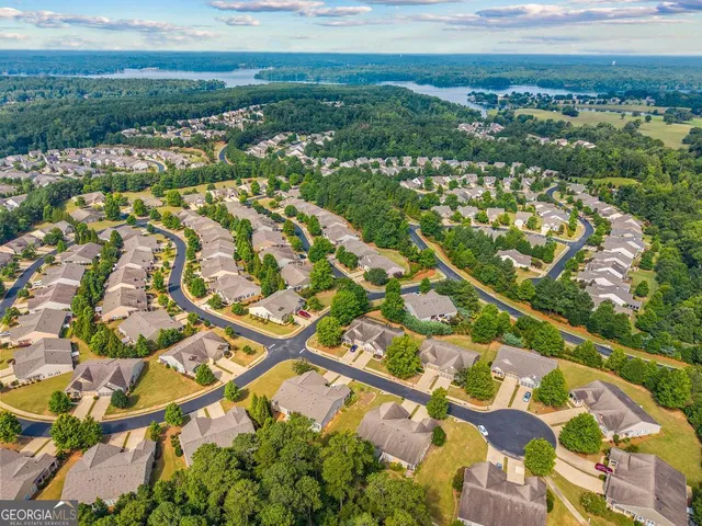 a view of swimming pool with a yard