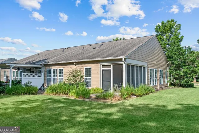 a view of a yard covered in snow