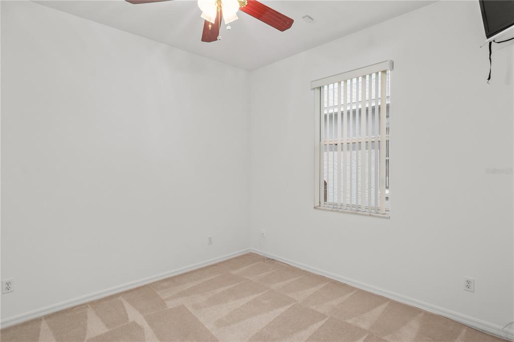 9441 Southwest 90th Street Ocala, FL 34481 - Photo 34 of 48 an empty room with a window
