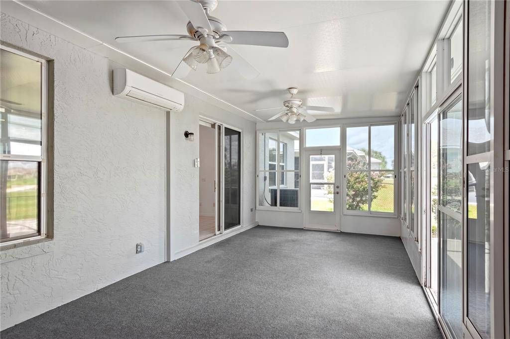 9441 Southwest 90th Street Ocala, FL 34481 - Photo 39 of 48 a view of an empty room with a window