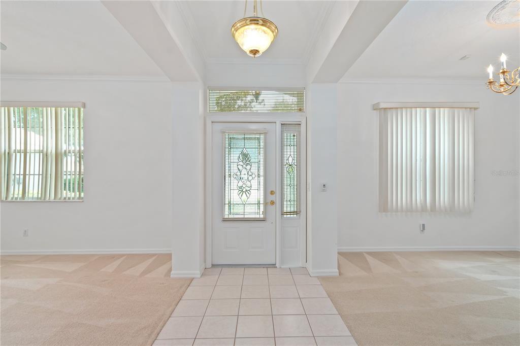 9441 Southwest 90th Street Ocala, FL 34481 - Photo 6 of 48 an empty room with windows