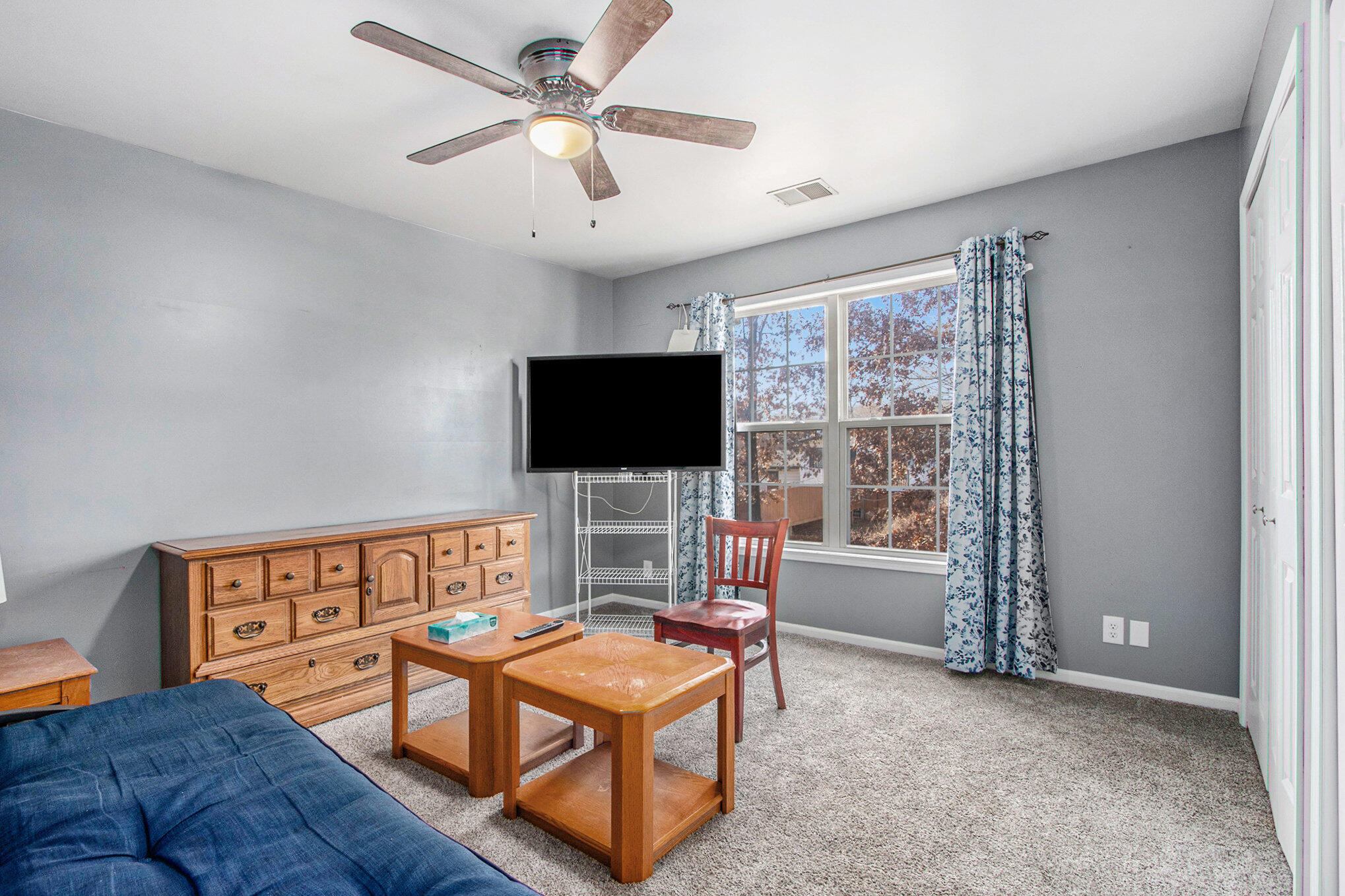 682 Dearborn Road, Unit A Valparaiso, IN 46385 - Photo 13 of 23 a living room with furniture and a flat screen tv