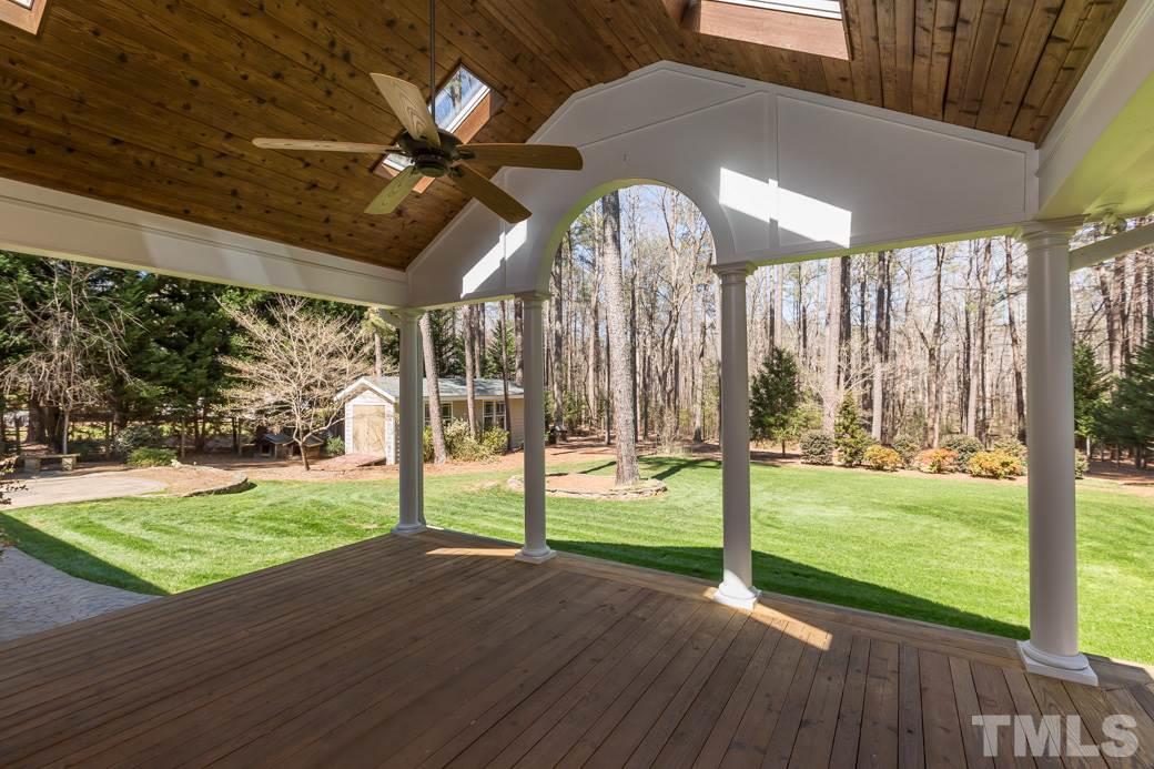 3120 Mt Vernon Church Road Raleigh, NC 27613 - Photo 4 of 9 a view of a room with wooden floor and porch