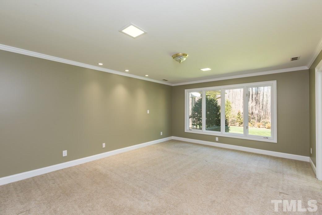 3120 Mt Vernon Church Road Raleigh, NC 27613 - Photo 7 of 9 a view of an empty room with a window