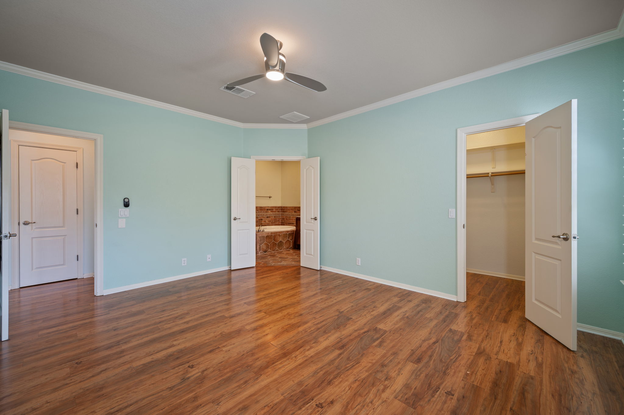 4229 John's Light Drive Austin, TX 78727 - Photo 13 of 27 a view of an empty room with wooden floor