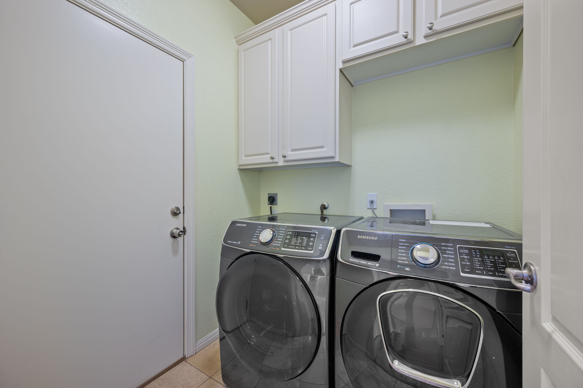 4229 John's Light Drive Austin, TX 78727 - Photo 22 of 27 a utility room with dryer and washer