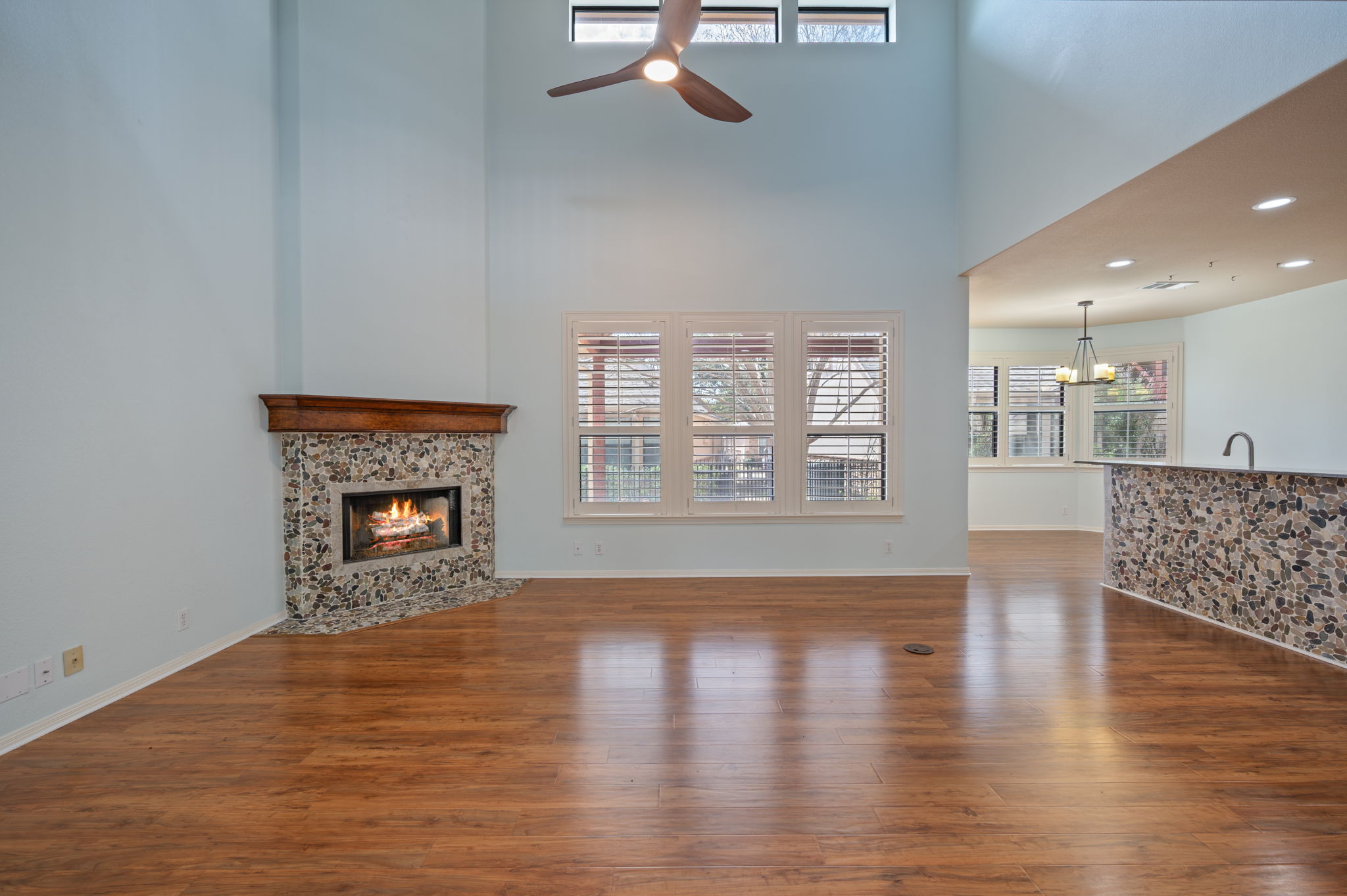 4229 John's Light Drive Austin, TX 78727 - Photo 3 of 27 a living room with furniture and a fireplace