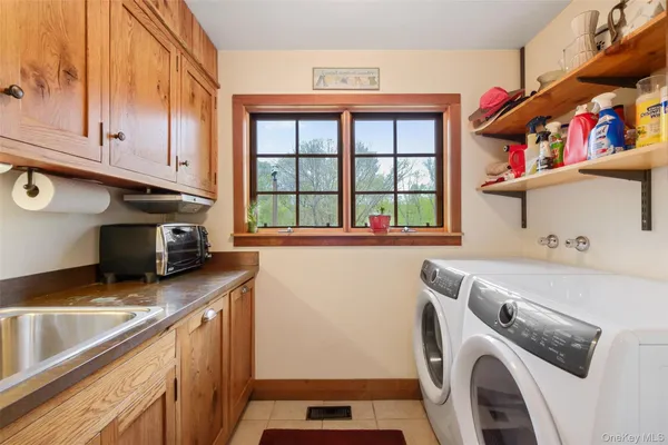 a utility room with dryer and washer
