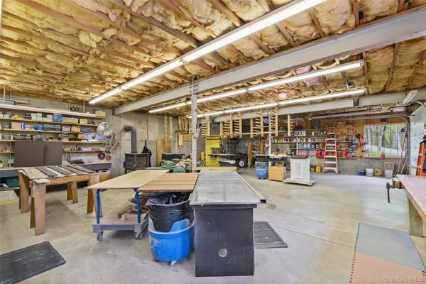 a view of a table and chairs in the garden
