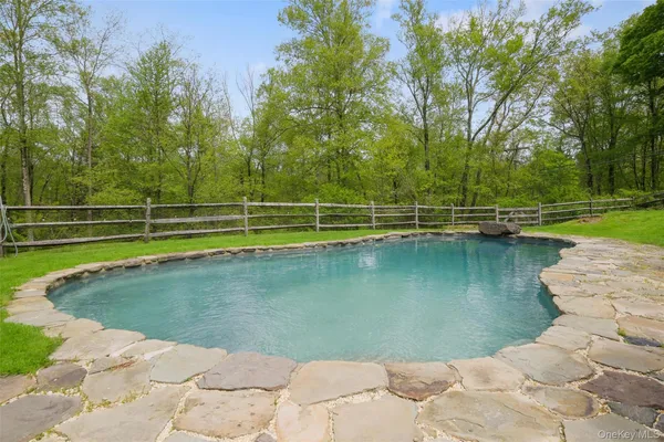 a view of outdoor space with deck and trees