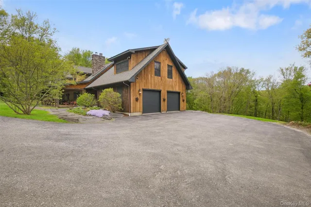 a view of a house with a street