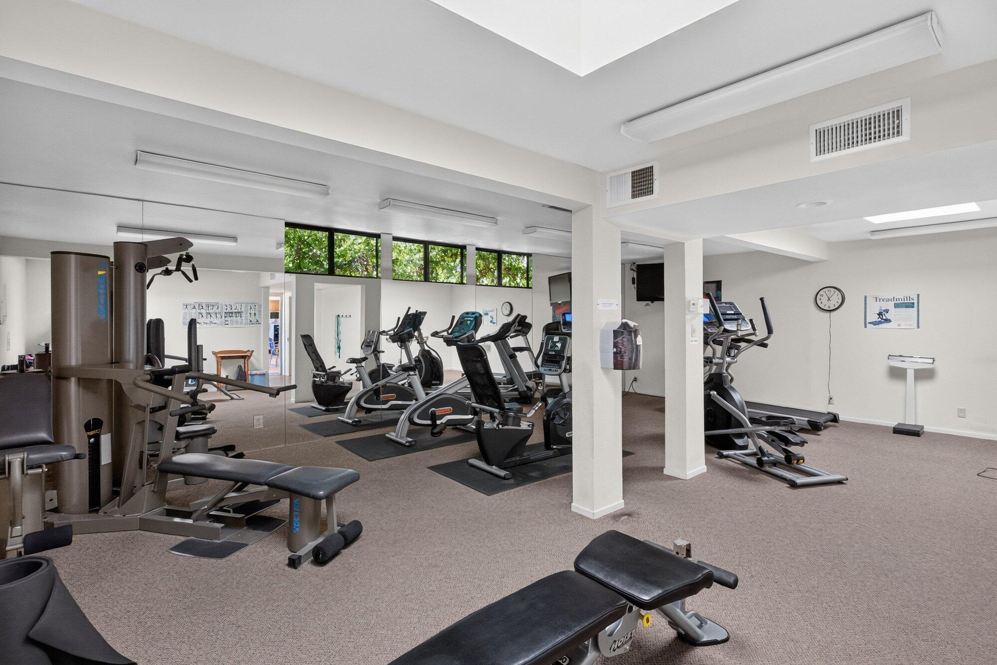 500 East Amado Road, Unit 313 Palm Springs, CA 92262 - Photo 24 of 32 a view of a room with gym equipment