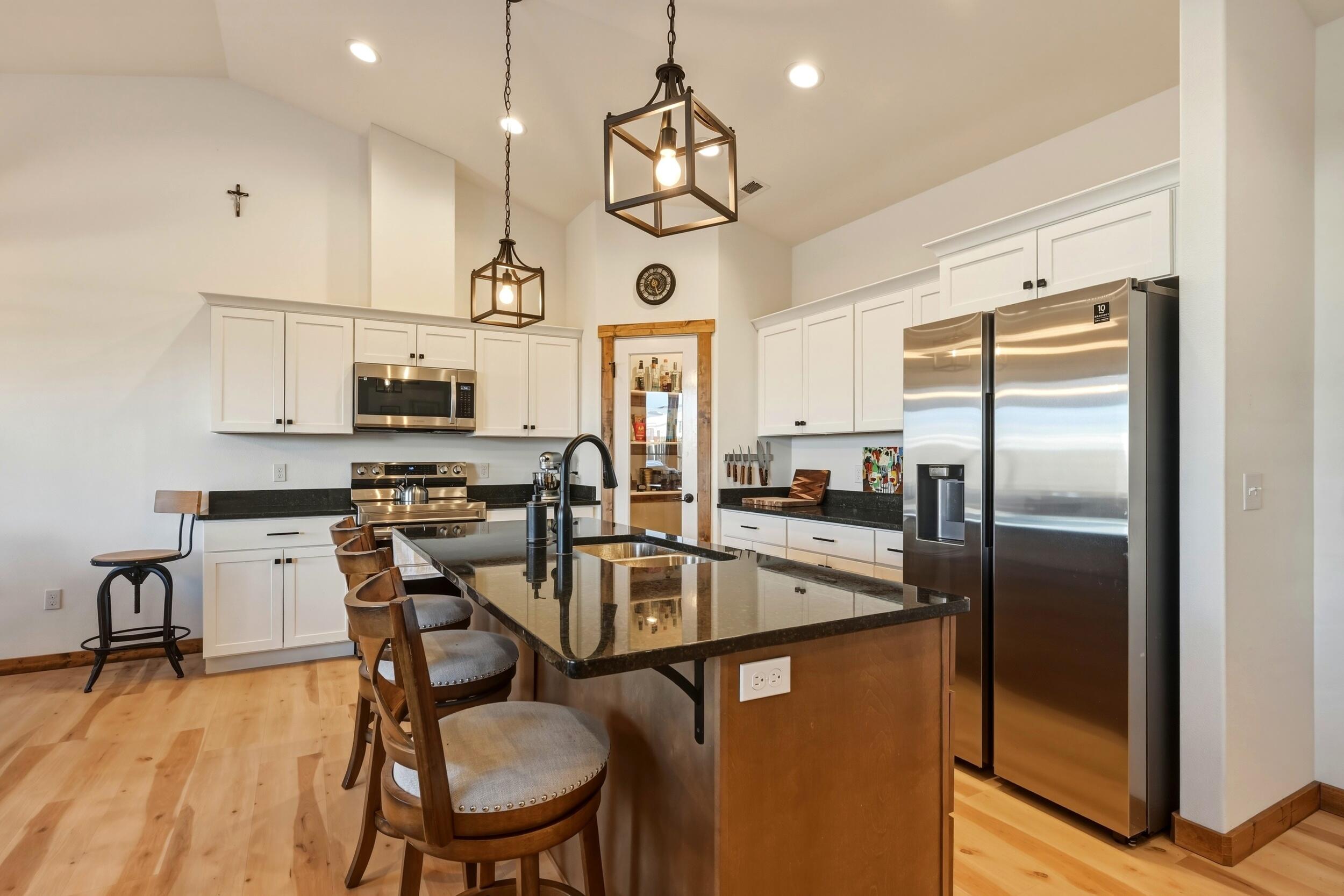 1353 Stoneridge Drive Ranchester, WY 82839 - Photo 7 of 43 kitchen with eat in island