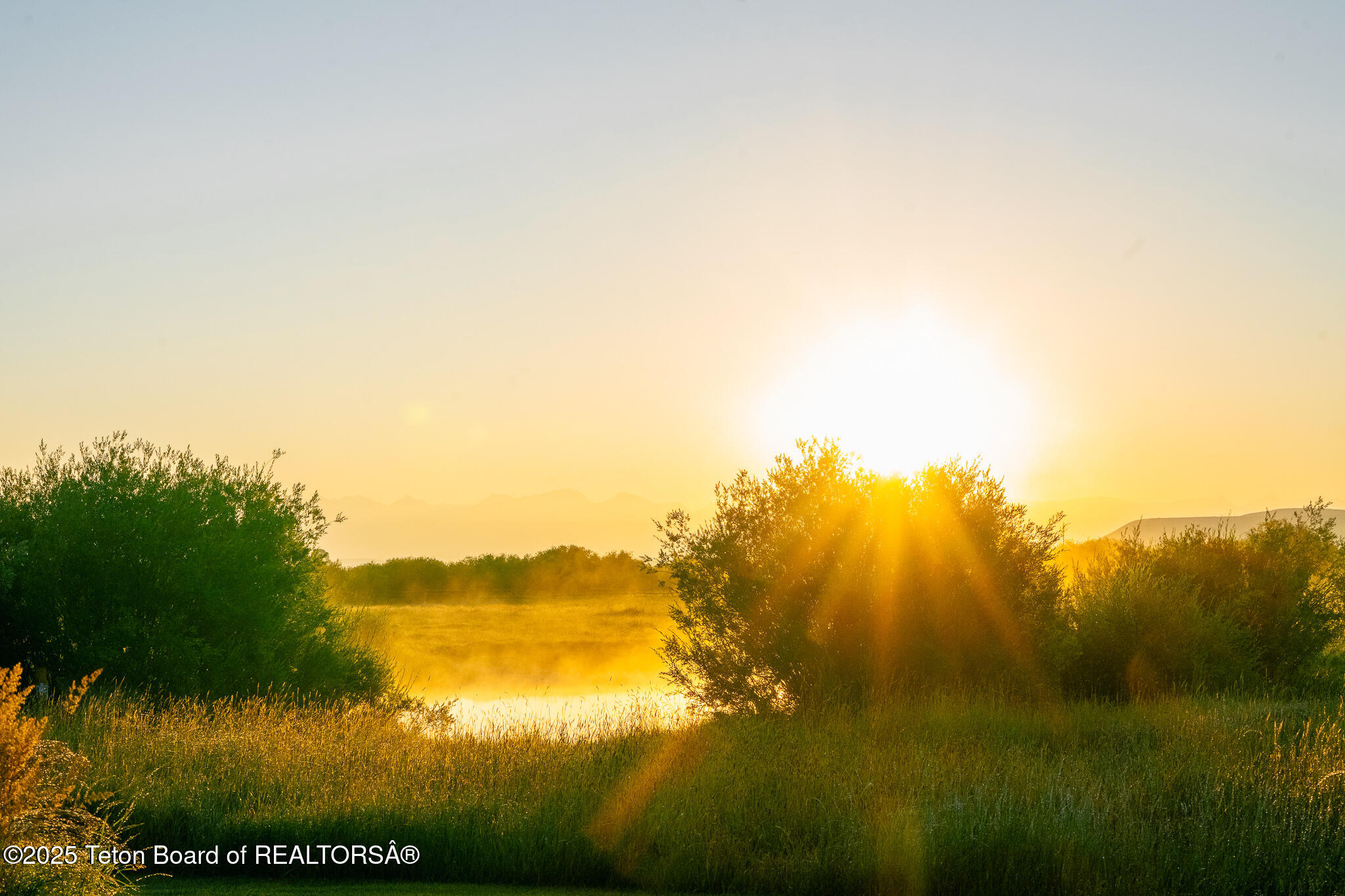 491 State Highway 354 Daniel, WY 83115 - Photo 30 of 34 Sunrise. Pond