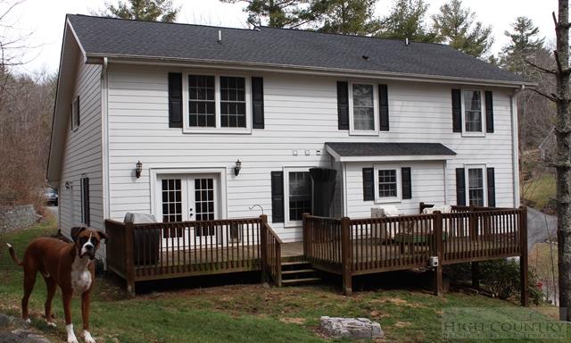 115 Martys Road Boone, NC 28607 - Photo 13 of 43 a front view of a house with a yard and deck