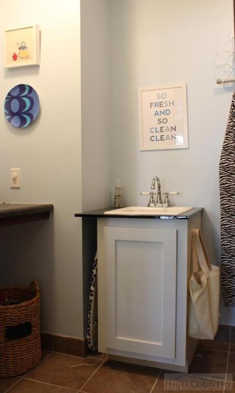 115 Martys Road Boone, NC 28607 - Photo 20 of 43 a bathroom with a sink and a mirror