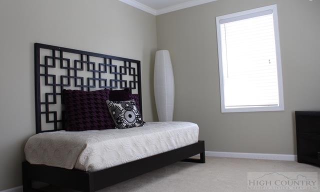 115 Martys Road Boone, NC 28607 - Photo 26 of 43 a bedroom with a bed and window
