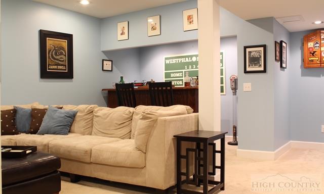 115 Martys Road Boone, NC 28607 - Photo 29 of 43 a living room with furniture and painting on the wall