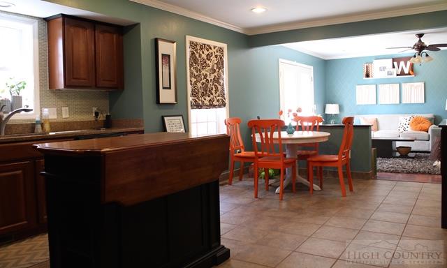 115 Martys Road Boone, NC 28607 - Photo 37 of 43 a kitchen with a table chairs and a sink