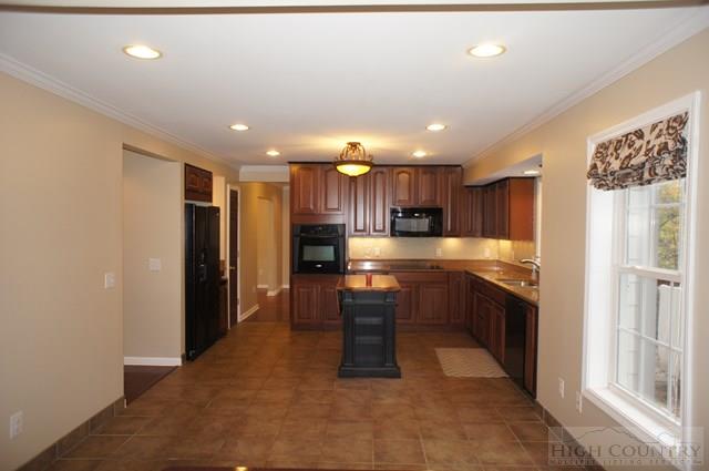 115 Martys Road Boone, NC 28607 - Photo 42 of 43 a kitchen with a refrigerator and a sink