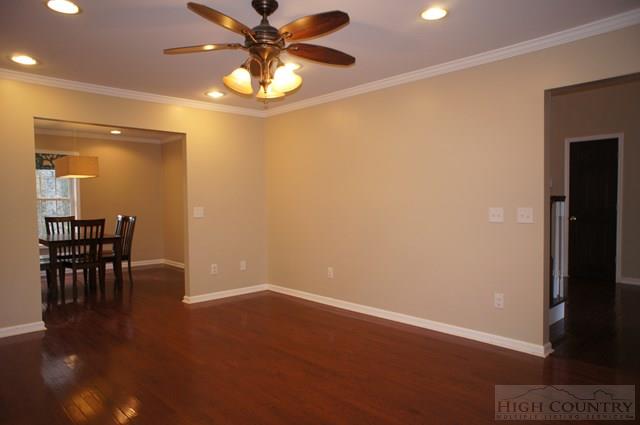 115 Martys Road Boone, NC 28607 - Photo 10 of 43 wooden floor in an empty room with a window