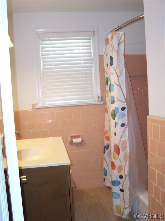 8410 Gaylord Road Henrico, VA 23229 - Photo 13 of 17 a bathroom with a bathtub and a shower curtain