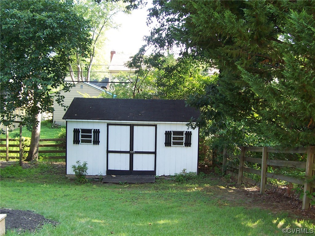 8410 Gaylord Road Henrico, VA 23229 - Photo 16 of 17 a view of a house with a yard