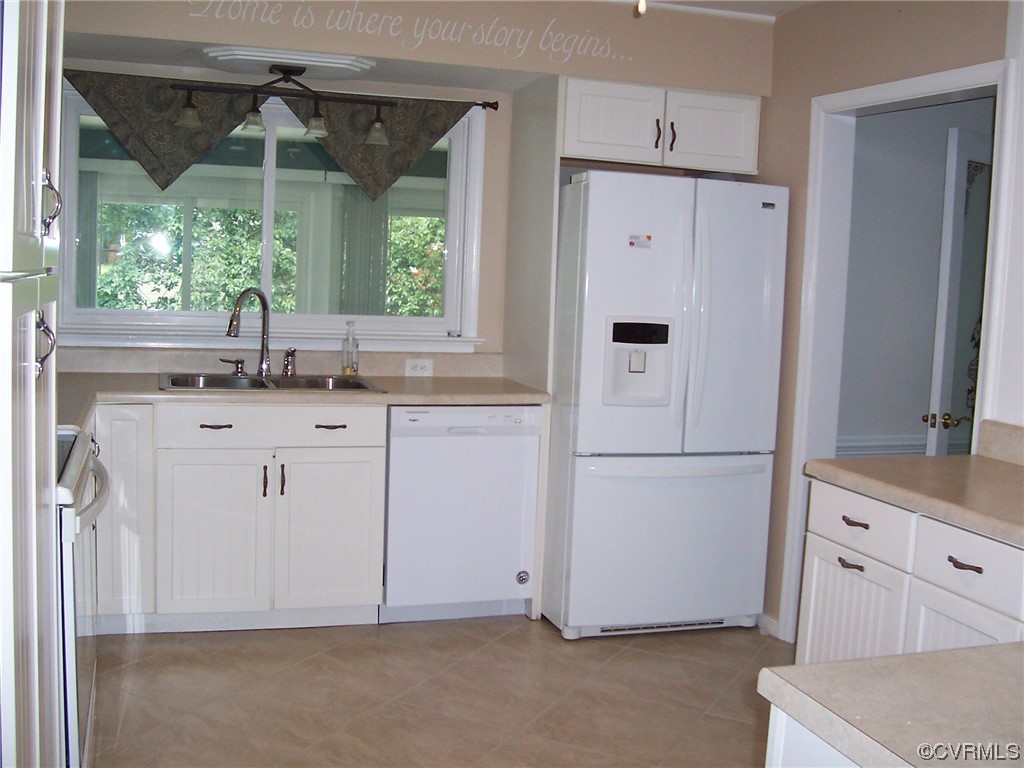 8410 Gaylord Road Henrico, VA 23229 - Photo 8 of 17 a kitchen with appliances cabinets and a sink