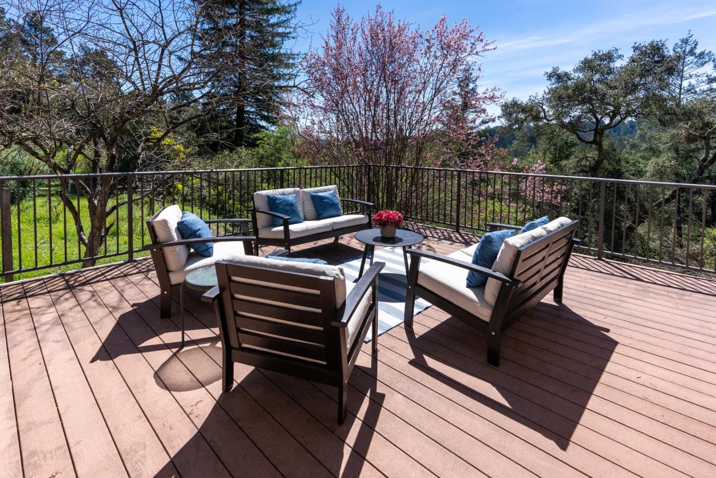 23342 Deerfield Road Los Gatos, CA 95033 - Photo 14 of 36 a view of a roof deck with wooden floor and outdoor seating