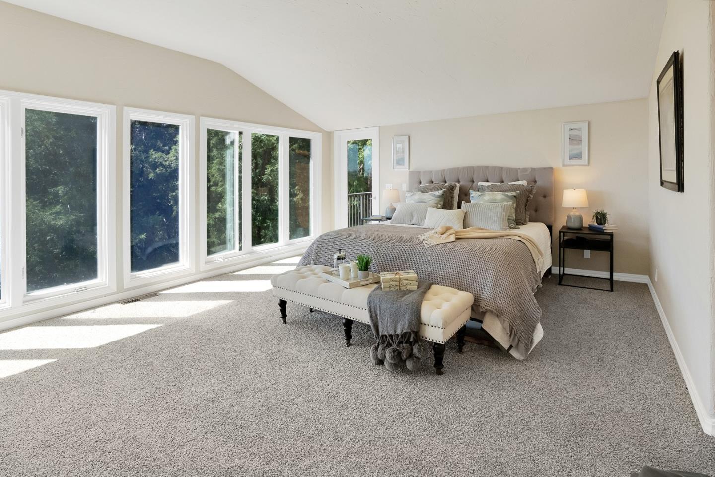 23342 Deerfield Road Los Gatos, CA 95033 - Photo 17 of 36 a bed room with a bed and a chair