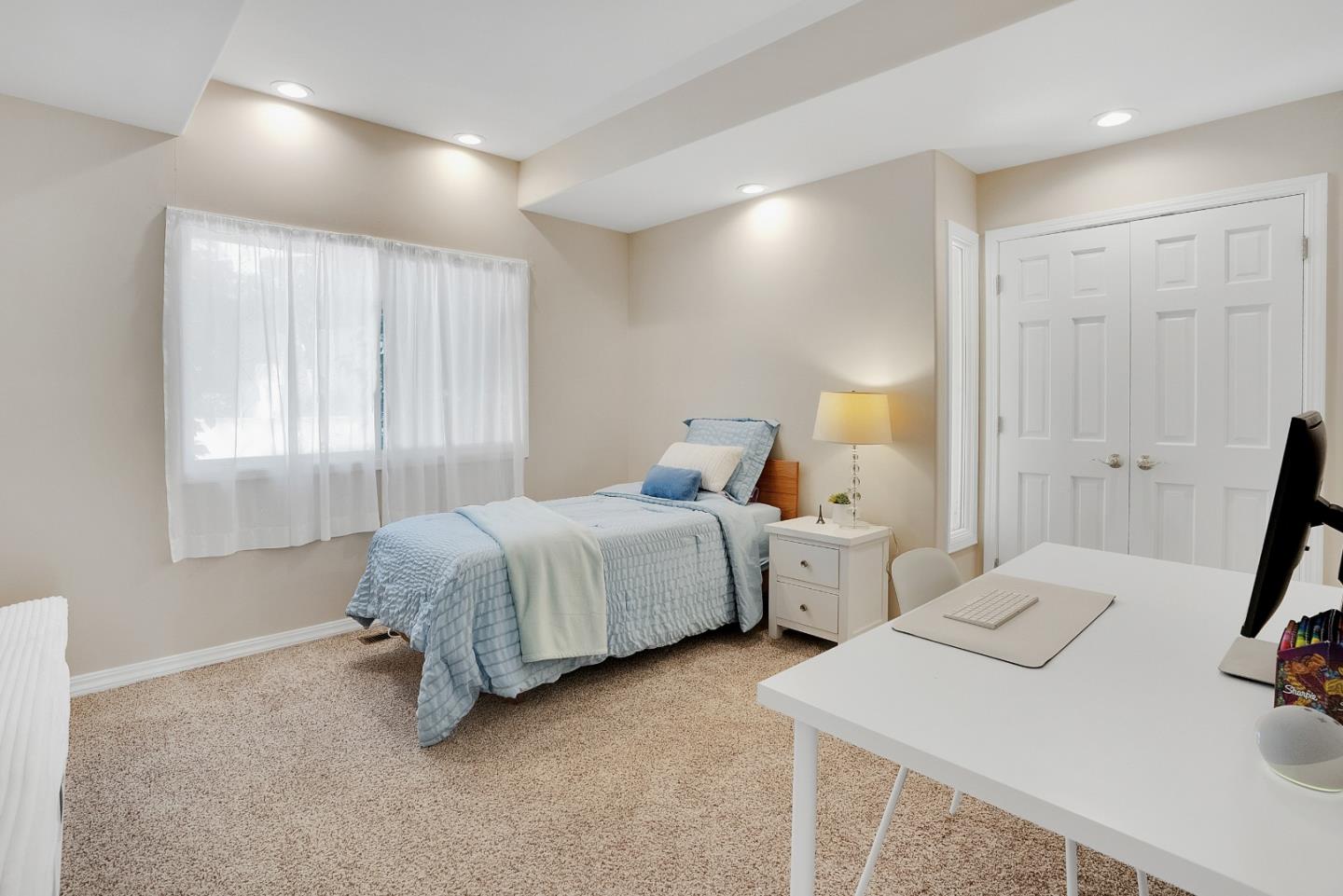 23342 Deerfield Road Los Gatos, CA 95033 - Photo 22 of 36 a spacious bedroom with two beds and painted walls