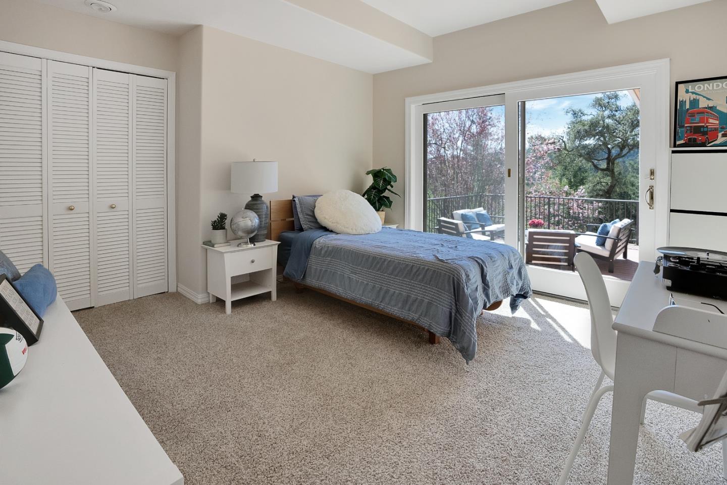 23342 Deerfield Road Los Gatos, CA 95033 - Photo 23 of 36 a bed room with a bed and a couch