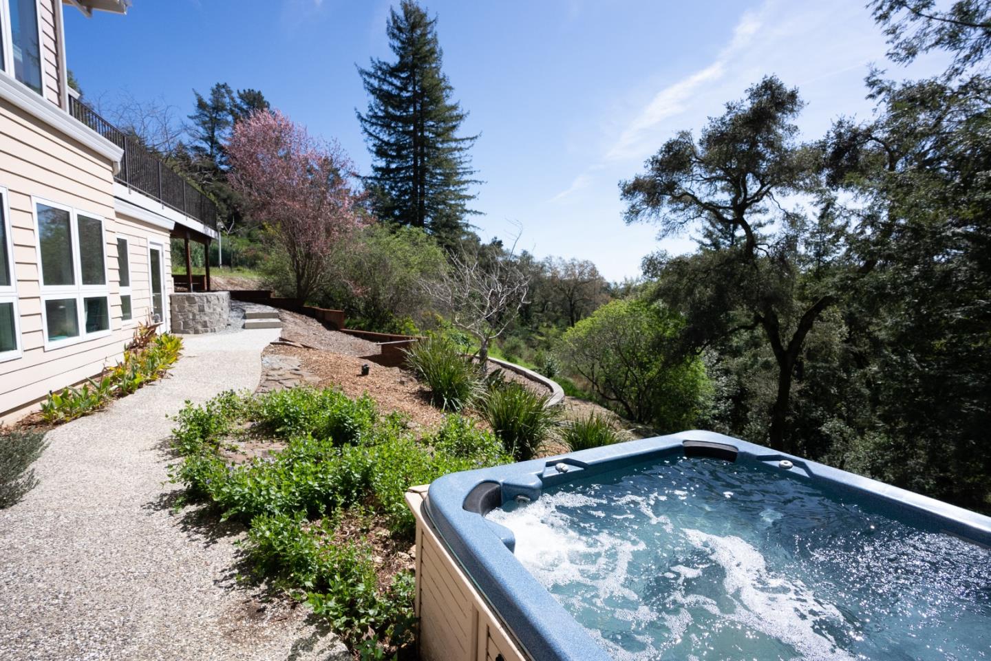 23342 Deerfield Road Los Gatos, CA 95033 - Photo 5 of 36 a backyard of a house with lots of green space