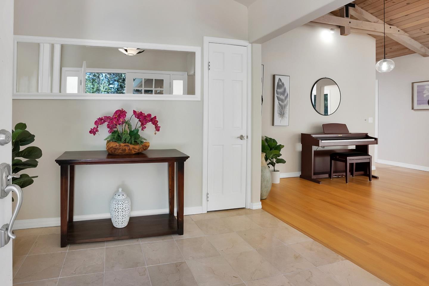 23342 Deerfield Road Los Gatos, CA 95033 - Photo 6 of 36 a living room with furniture and a table