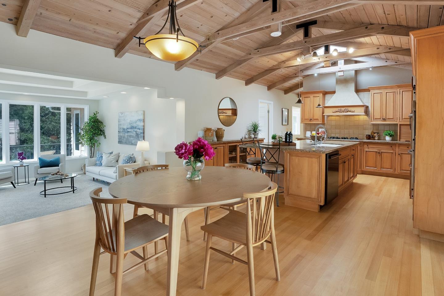 23342 Deerfield Road Los Gatos, CA 95033 - Photo 10 of 36 a view of a dining room with furniture and chandelier