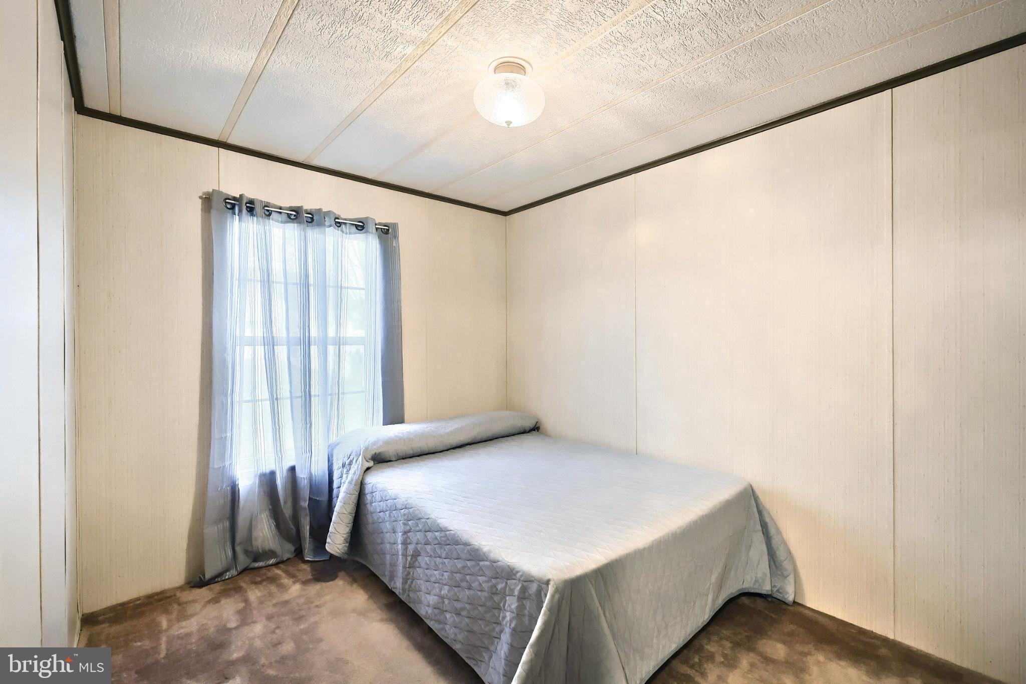 2818 Oakland Road Dover, PA 17315 - Photo 24 of 32 a bedroom with a bed and a window