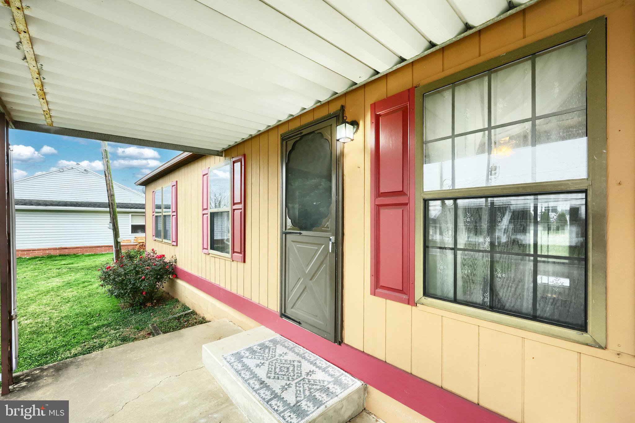 2818 Oakland Road Dover, PA 17315 - Photo 5 of 32 a front view of a house with a yard