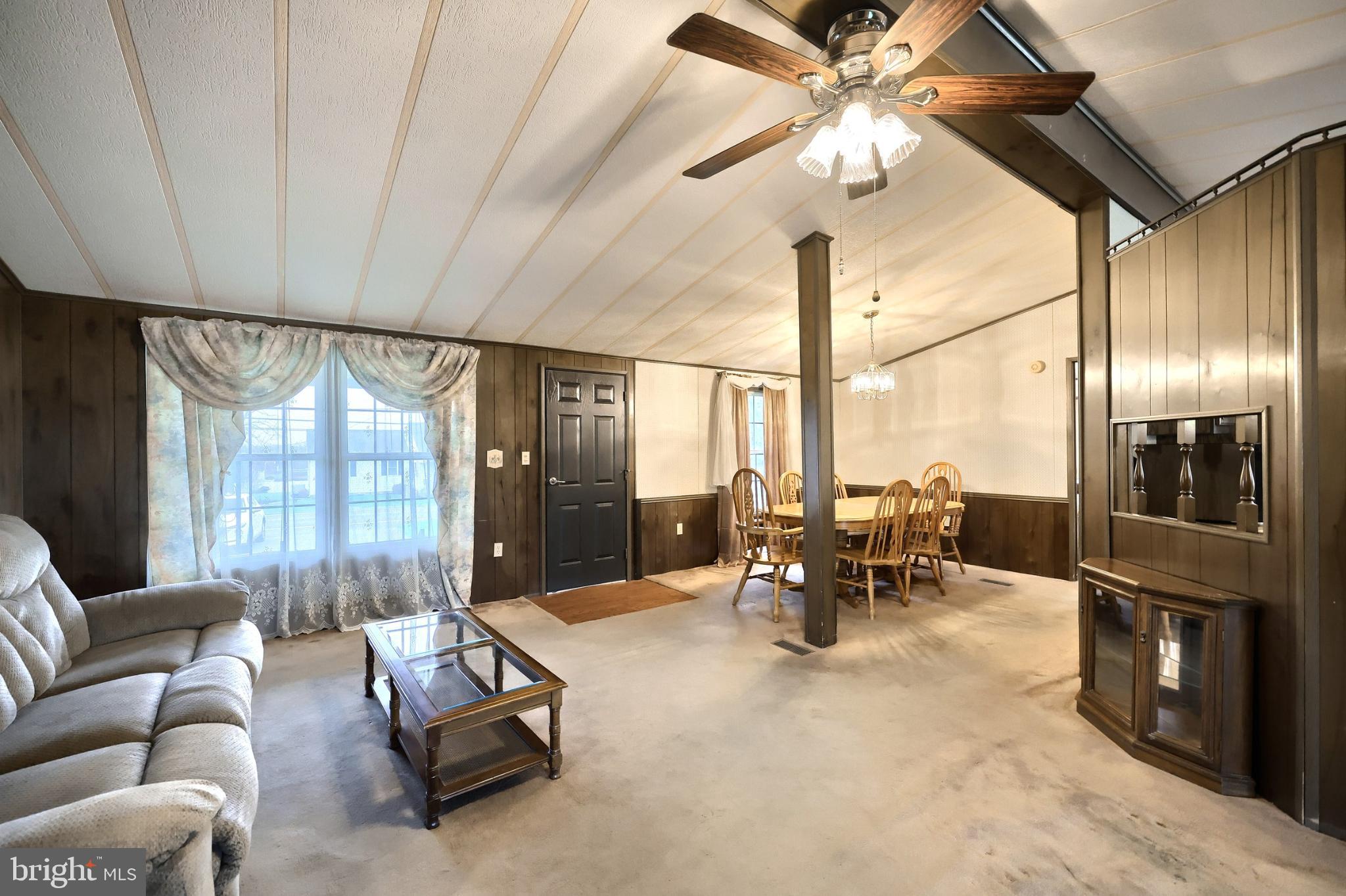 2818 Oakland Road Dover, PA 17315 - Photo 32 of 32 a living room with furniture a large window with outer view