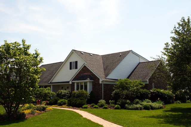 50W663 Ramm Road Maple Park, IL 60151 - Photo 1 of 25 a front view of a house with garden