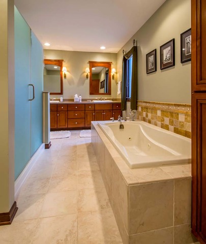 50W663 Ramm Road Maple Park, IL 60151 - Photo 11 of 25 a spacious bathroom with a tub double vanity and a mirror