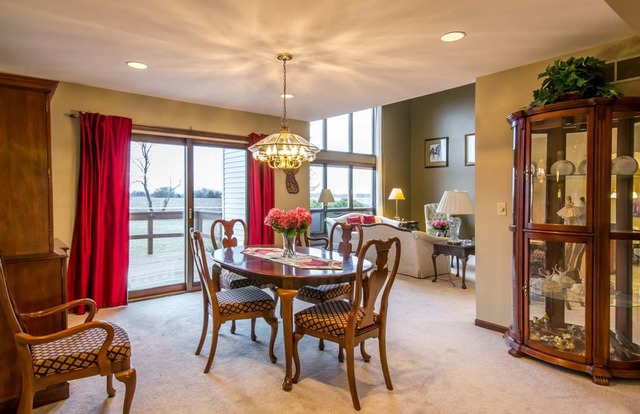 50W663 Ramm Road Maple Park, IL 60151 - Photo 12 of 25 a view of a dining room with furniture window and wooden floor
