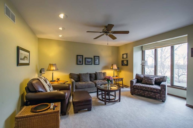 50W663 Ramm Road Maple Park, IL 60151 - Photo 4 of 25 a living room with furniture and a large window
